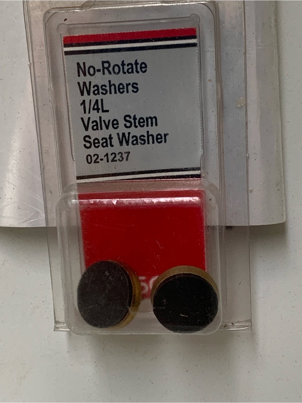 No-Rotate 1/4L Valve Stem Seat Washers - Black and Brass
